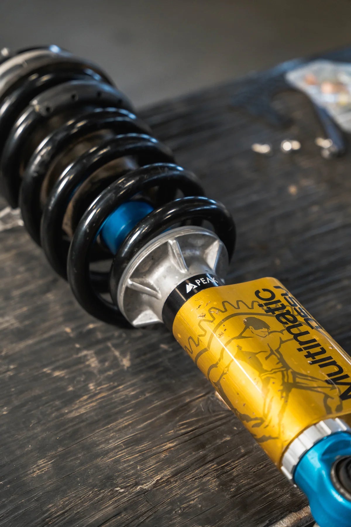 Multimatic DSSV shock absorber installed with Peak Suspension components, illustrating the compatibility of the 2 Piece Collar Lift Kit for Silverado ZR2 and Sierra AT4X.