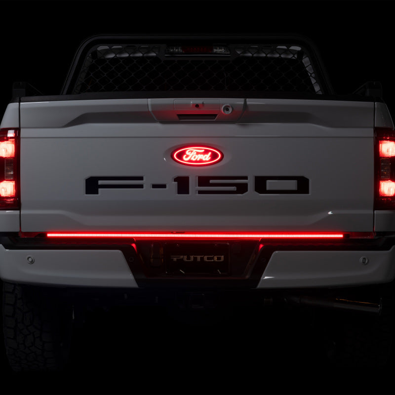 Putco 2021+ Ford F150 with Halogen Taillights featuring a 60 inch Freedom Blade LED Tailgate Light Bar, showcasing bright red lights for enhanced visibility.