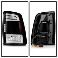 Load image into Gallery viewer, Spyder 19-24 Dodge Ram 2500/3500 HD LED Tail Lights - Blk (ALT-YD-DR19HDLEDBSAP-GRSEQ-BK)