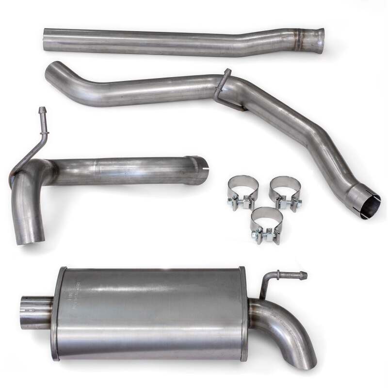 Multiple components of the Banks Power 18-22 Jeep Wrangler 3.6L 4 Door Monster Sport Exhaust System laid out, illustrating the high-quality stainless steel pipes and muffler for enhanced exhaust flow.