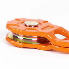 Load image into Gallery viewer, Close-up view of a 12 Ton Forged Snatch Block by RotopaX, showcasing its vibrant orange color and intricate design.