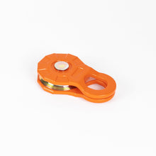 Load image into Gallery viewer, Top-down view of a 12 Ton Forged Snatch Block by RotopaX, featuring its bright orange exterior and metallic details.