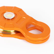 Load image into Gallery viewer, Detailed shot of a 12 Ton Forged Snatch Block by RotopaX, emphasizing the unique shape and orange color.