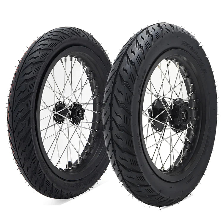 14 inch Supermoto wheels set by Puget Sound Motorsports, featuring durable black tires and stainless steel spokes, designed for optimal performance.