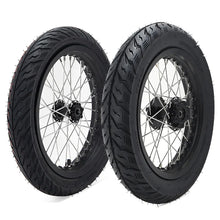Load image into Gallery viewer, 14 inch Supermoto wheels set by Puget Sound Motorsports, featuring durable black tires and stainless steel spokes, designed for optimal performance.