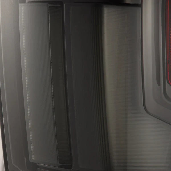 AlphaRex 16-23 Toyota Tacoma NOVA-Series Prismatic LED Tail Lights Black
