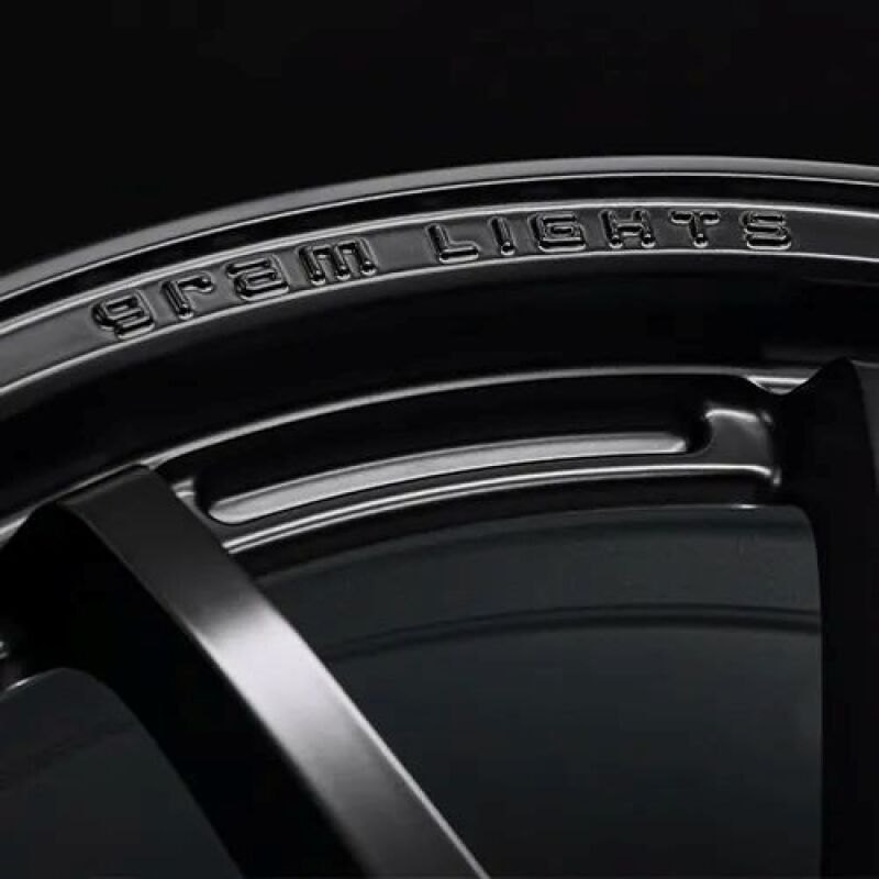 Gram Lights 57NR LIMITED II 17x7.0 +47 5-114.3 Semigloss Black Wheel w/ Black Cap/Stickers/Air Valve