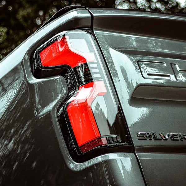 AlphaRex 19-25 Chevrolet Silverado 1500 / 20-25 Silverado 2500HD/3500HD LUXX-Series LED Tail Lights Black