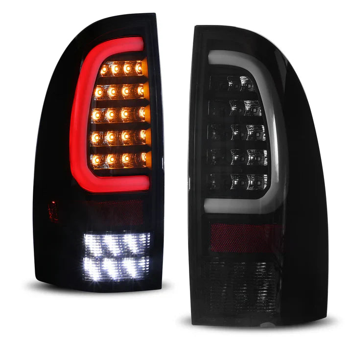 Winjet 2005-2015 Toyota Tacoma LED Sequential Tail Light w/Yellow Turn Signal - Black / Smoke