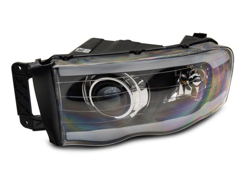 Raxiom 02-05 Dodge RAM 1500/2500/3500 Axial LED Projector Headlights- Blk Housing (Clear Lens)