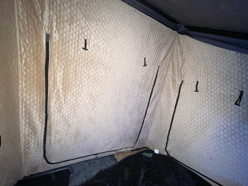 Interior view of the RTT Insulation by Dirtbox Overland, showcasing durable insulation walls designed for the Telurika Rooftop Tent, enhancing warmth and comfort for outdoor adventures.