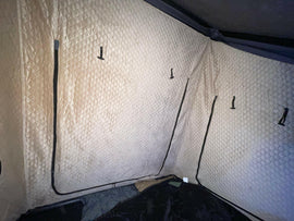 Interior view of the RTT Insulation by Dirtbox Overland, showcasing durable insulation walls designed for the Telurika Rooftop Tent, enhancing warmth and comfort for outdoor adventures.