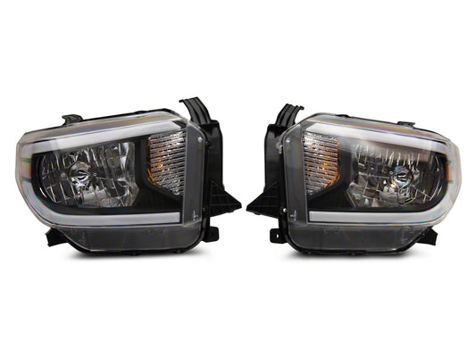 Raxiom 14-21 Toyota Tundra Axial Series Headlights w/ SEQL LED Bar- Black Housing (Clear Lens)