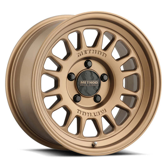 Method MR318 wheel featuring an 18x8.5 size, +40mm offset, and 5x150 bolt pattern in bronze color. Designed by Method Wheels, this stylish wheel is a perfect fit for light trucks, showcasing clean lines and the popular TOPO Center Cap to enhance vehicle aesthetics.
