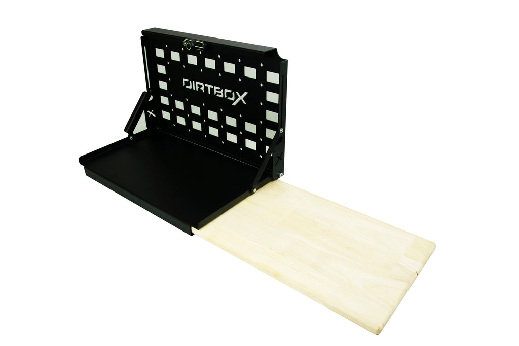DirtBox Overland Folding Camp Table featuring an attached cutting board, ideal for outdoor cooking and meal prepping on the go.
