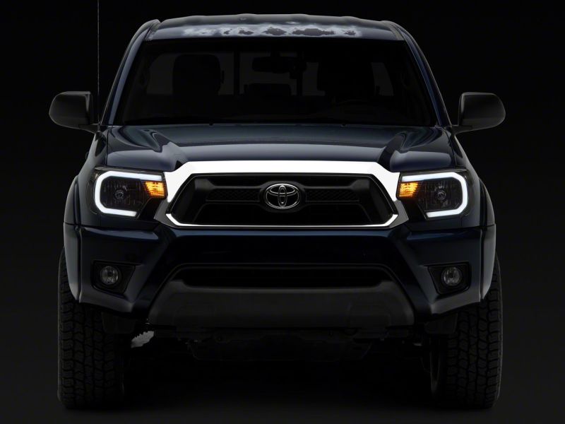 Raxiom 12-15 Toyota Tacoma Axial Series Headlights w/ LED Bar- Black Housing (Clear Lens)