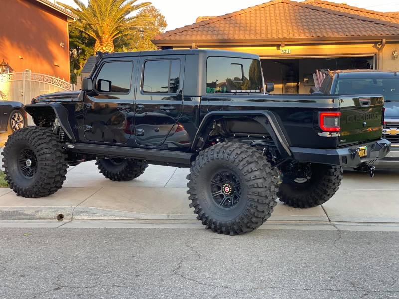 Rear angle view of Jeep Gladiator JT with ORACLE Lighting Flush Mount LED Tail Lights, enhancing visibility.