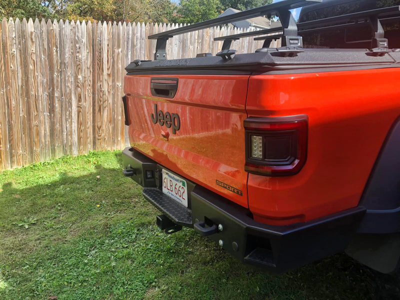 Illuminated Jeep Gladiator JT featuring ORACLE Lighting Flush Mount LED Tail Lights, enhancing nighttime visibility.
