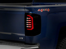 Load image into Gallery viewer, Raxiom 14-18 Chevrolet Silverado 1500 Axial Series LED Tail Lights- Blk Housing (Smoked Lens)