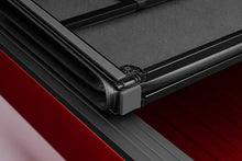 Load image into Gallery viewer, Lund 15-17 Chevy Colorado Fleetside (5ft. Bed) Hard Fold Tonneau Cover - Black