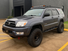 Load image into Gallery viewer, Cali Raised 03-09 Toyota 4Runner Trail Edition Bolt On Rock Sliders - Kick Out / Powder Coat