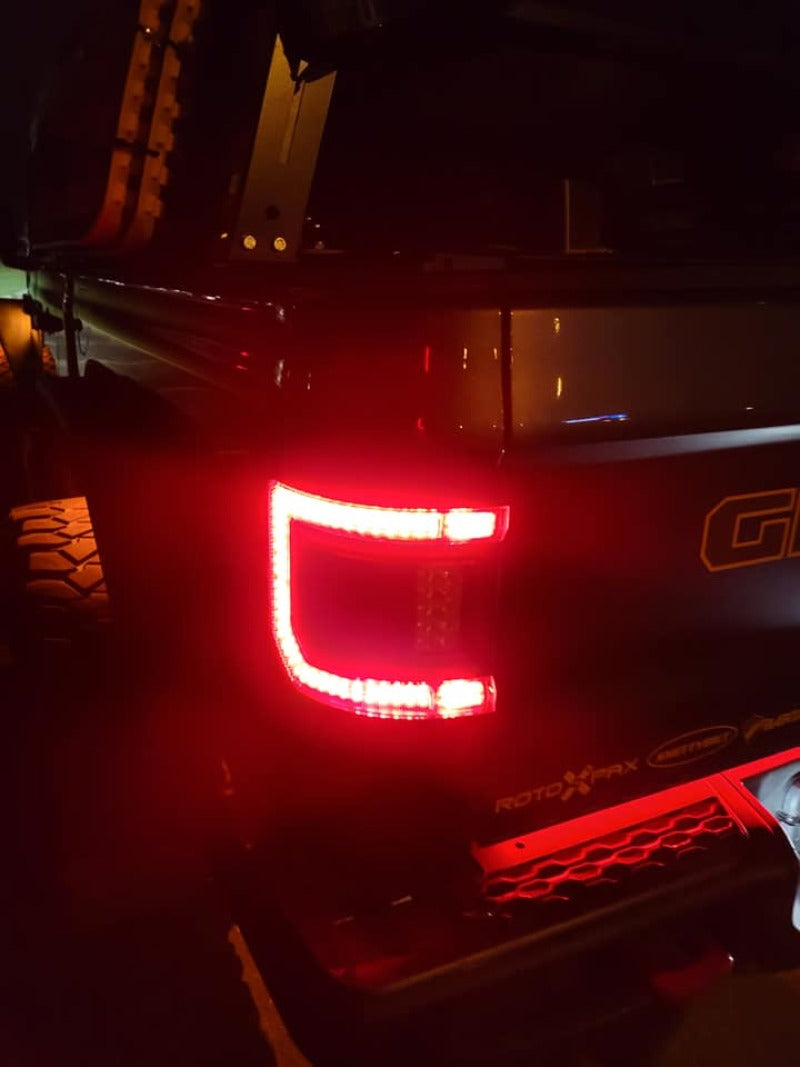 Jeep Gladiator JT with ORACLE Lighting Flush Mount LED Tail Lights providing bright reverse light function.