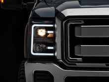 Load image into Gallery viewer, Raxiom 11-16 Ford F-250 Super Duty LED Projector Headlights - Blk Housing (Clear Lens)