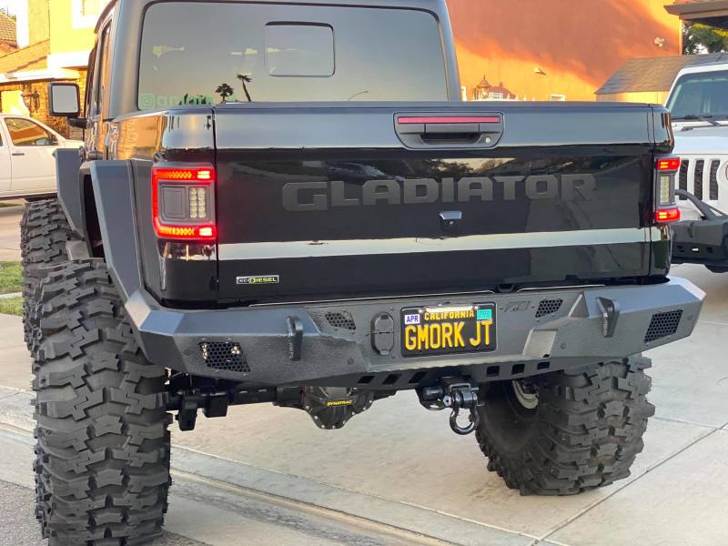 ORACLE Lighting Flush Mount LED Tail Lights on Jeep Gladiator JT illuminated at night.