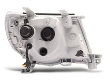 Load image into Gallery viewer, Raxiom 05-11 Toyota Tacoma Axial Series LED DRL Projector Headlights- Blk Housing (Clear Lens)