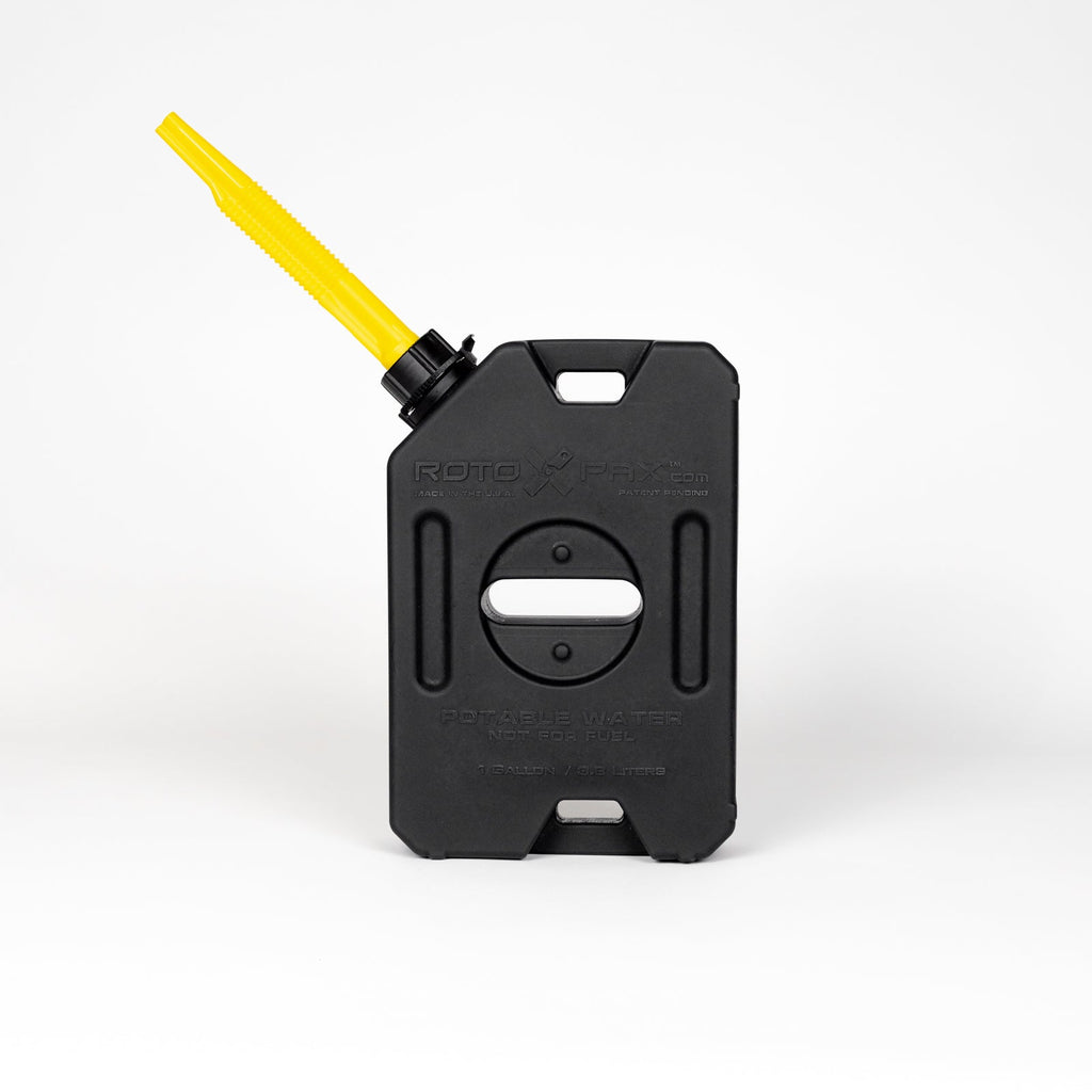 Practical use of the RotopaX 1 Gallon Water Black container on a hiking trip, demonstrating its portability and reliability.