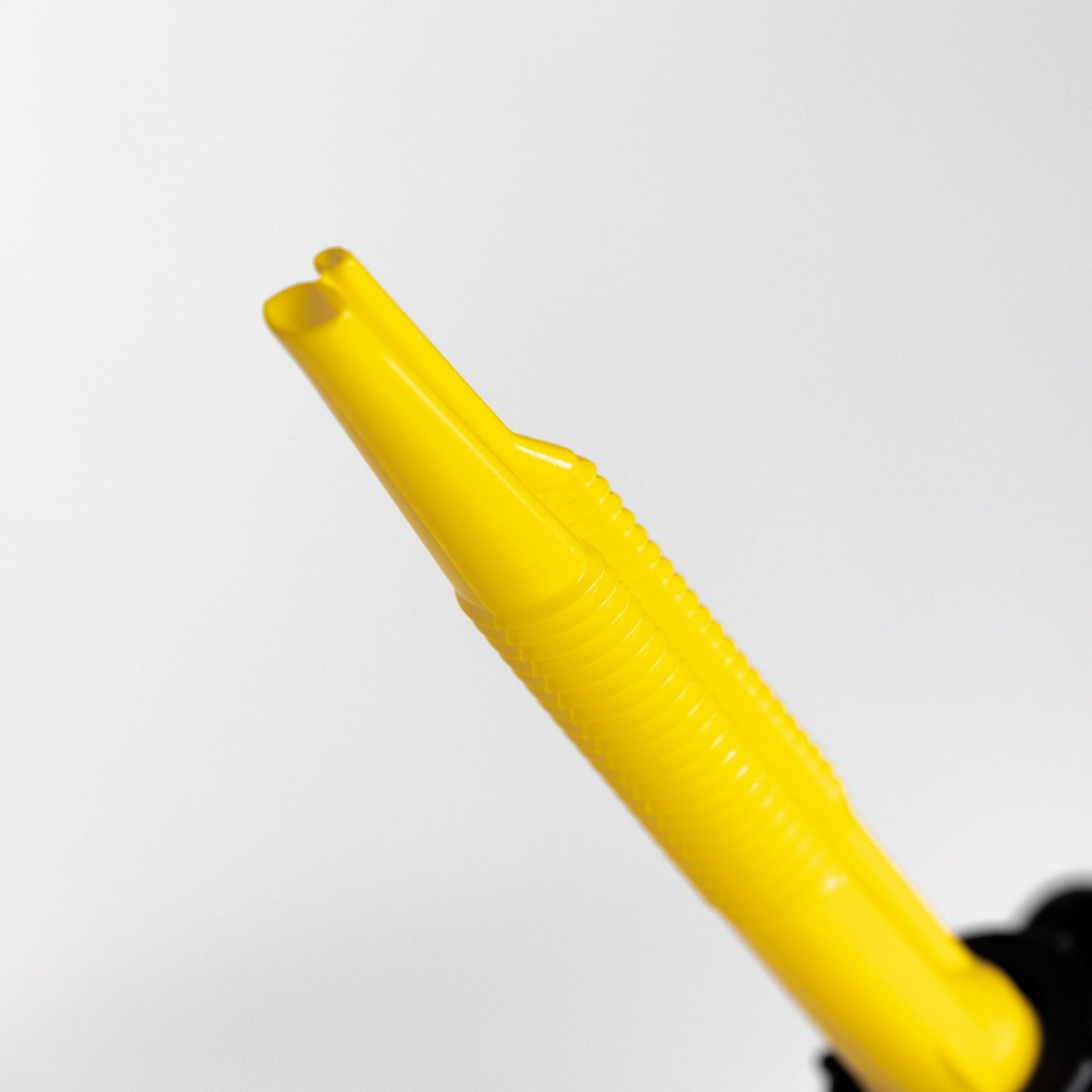 Close-up of the yellow spout on the 2 Gallon Water GEN2 Black container by RotopaX, designed for convenient water pouring.