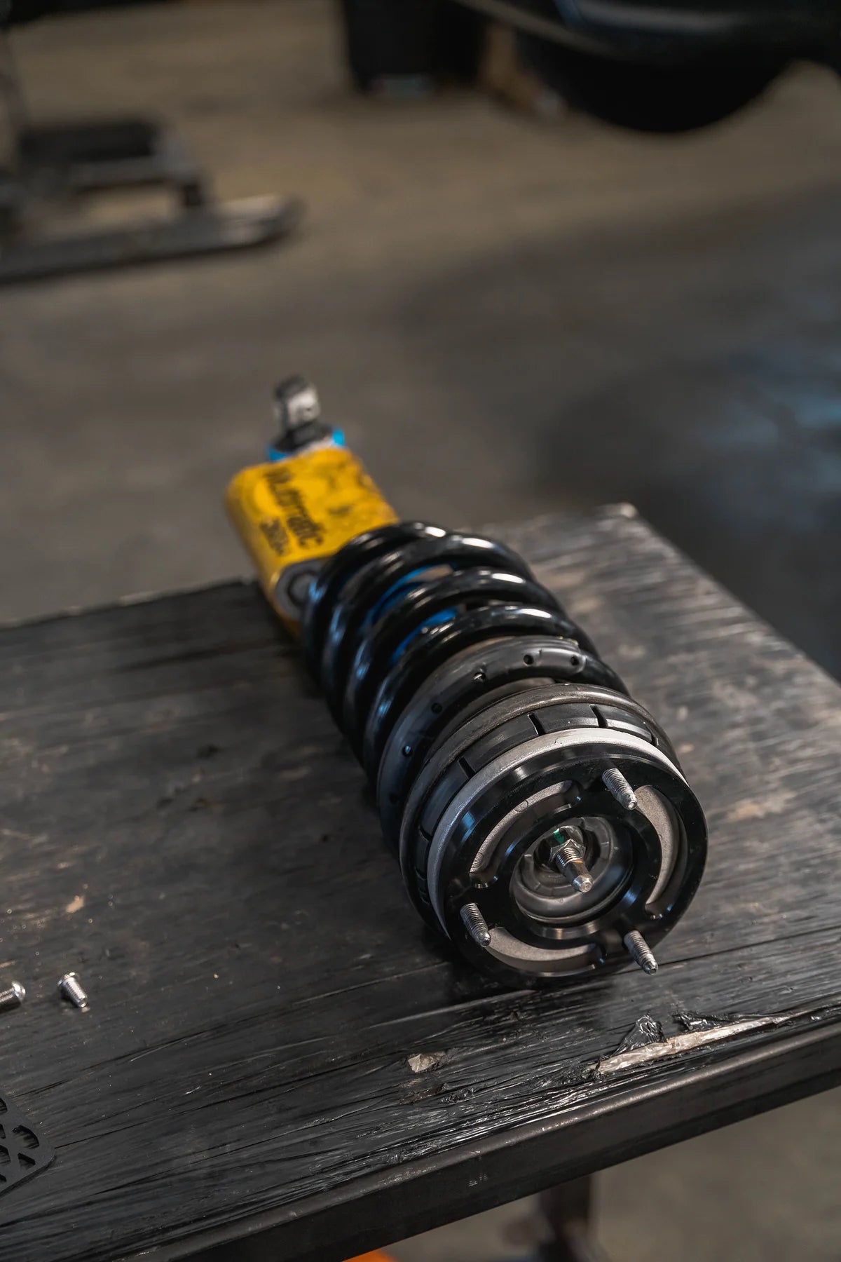 PEAK Suspension Silverado ZR2 Leveling Kit featuring a Multimatic DSSV shock with coil assembly, emphasizing quality and performance for off-road adventures.