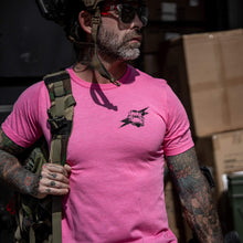 Load image into Gallery viewer, Close-up of a pink t-shirt displaying 'Scars Remind You That You're Alive' by Combat Iron Apparel.
