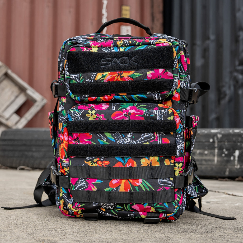 Combat Iron Apparel 25L Sack™ Original All-Day Molle Backpack with Pouch secured on a person, ready for adventure.