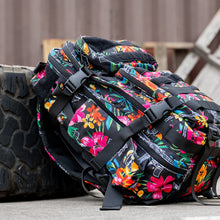 Load image into Gallery viewer, Side view of the Combat Iron Apparel 25L Sack™ Original All-Day Molle Backpack with Pouch, fully loaded with outdoor gear.