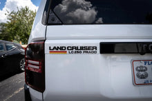 Load image into Gallery viewer, "LC 250 Prado" Acrylic Laser Series Tailgate Badge - 2024+ Land Cruiser