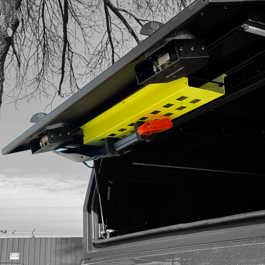 Dirtbox Overland Limited Drop Color Coated Molle Panel Fishing Rod Case Bundle with Neon Yellow and camping gear showcased.