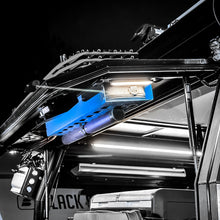 Load image into Gallery viewer, Dirtbox Overland Limited Drop Color Coated Molle Panel Fishing Rod Case Bundle mounted inside a vehicle's gullwing door.