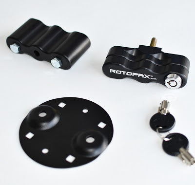 Components of the LOX Pack Mount by RotopaX including the mount base, handle, and security key.