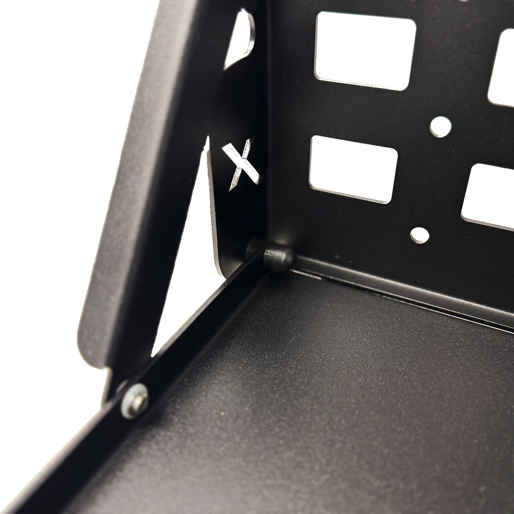 Detailed shot of the Dirtbox Overland Folding Camp Table with Cutting Board, showing the inner mechanics and robust build quality.