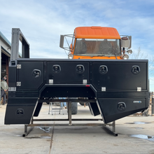 Load image into Gallery viewer, Transformer Drop Center Flatbed by DirtBox Overland, featuring a robust structure and convenient storage options, perfect for overland and camper setups.