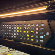 Load image into Gallery viewer, Close-up view of the Security Window Molle Panel by Dirtbox Overland showcasing durable T5 aluminum design with attachment points for small gear.