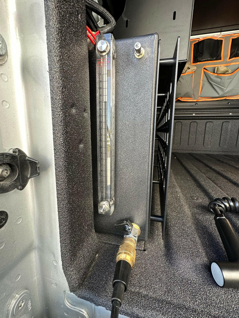 Side view of the Dirtbox Overland In Bed 15 Gallon Water Tank focusing on the built-in freeze-proof heating element and easy installation for outdoor adventures.