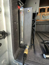 Load image into Gallery viewer, Side view of the Dirtbox Overland In Bed 15 Gallon Water Tank focusing on the built-in freeze-proof heating element and easy installation for outdoor adventures.