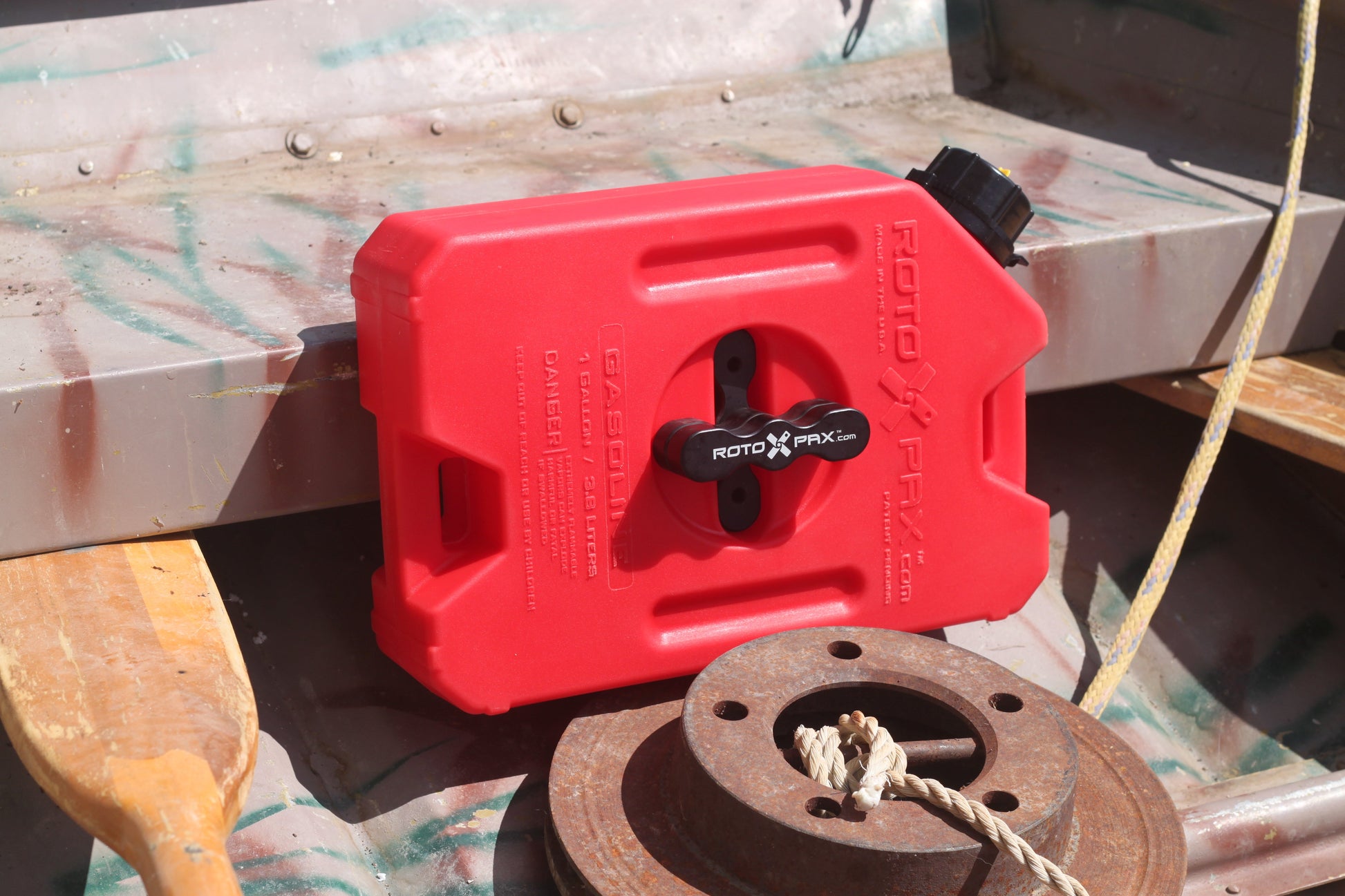 Durable and lightweight 1 Gallon Gasoline container by RotopaX with ergonomic handle for easy pouring.