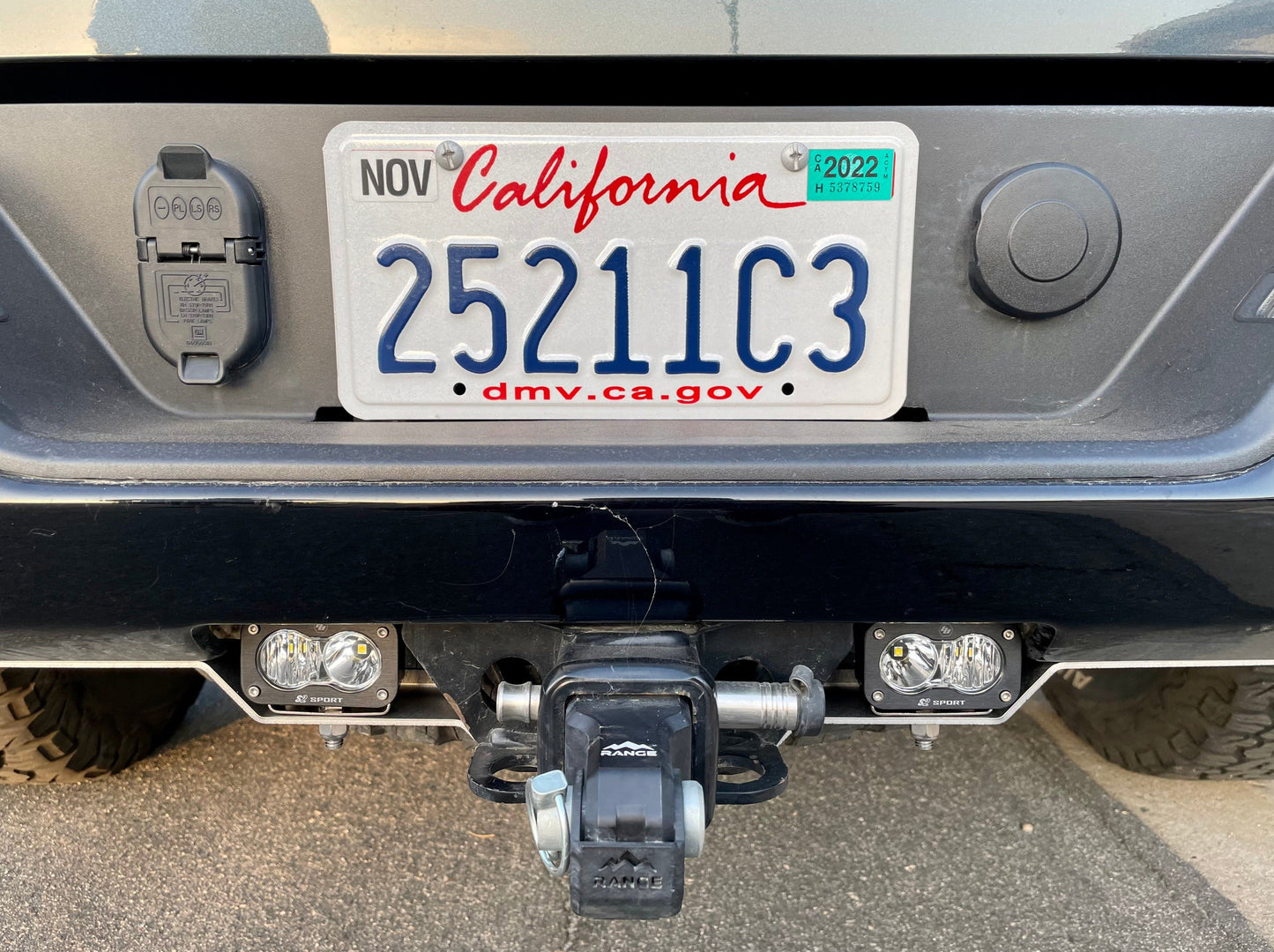 Close-up of a 2019+ Silverado 1500 with Range Industries rear facing light mount holding Diode Dynamics SSC2 lights, demonstrating precision in design and function.