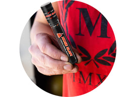 Close-up of a user holding Nose Slap! 2-Pack from Battlbox.com, showcasing its convenient design for a quick energy boost.