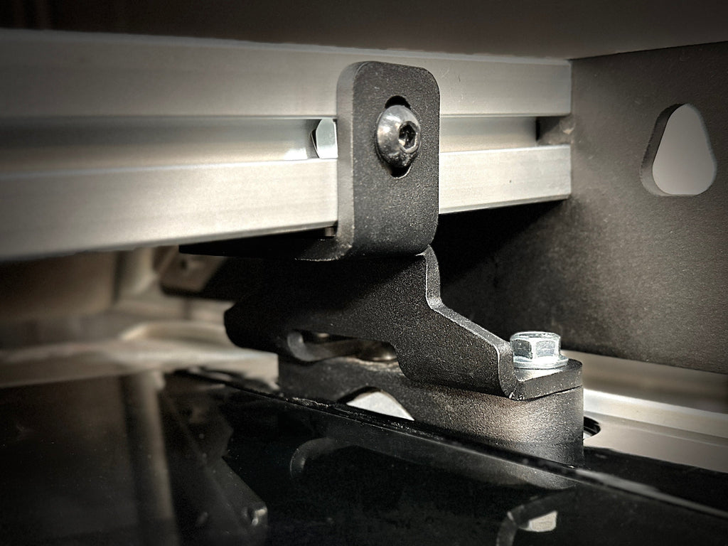 Detailed view of the adjustable components of the 'Laguna' roof rack for Rivian R1T from Range Industries, showcasing its versatility and strong build.