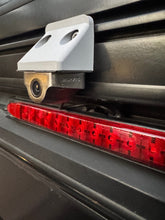 Load image into Gallery viewer, Close-up view of the Canopy Camper Rear Camera Relocation Mount by Dirtbox Overland, showcasing its durable design and mounted rear camera, ideal for off-road adventures and enhancing vehicle visibility.