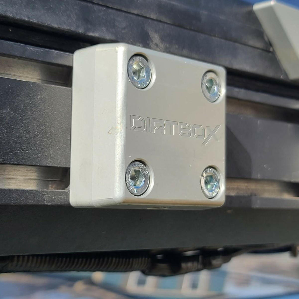 Close-up of The Chunk Quick Release Bracket by Dirtbox Overland, showcasing durability and precision engineering for outdoor adventures.